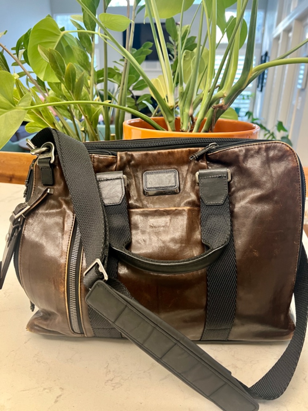 TUMI men's leather briefcase/laptop bag
